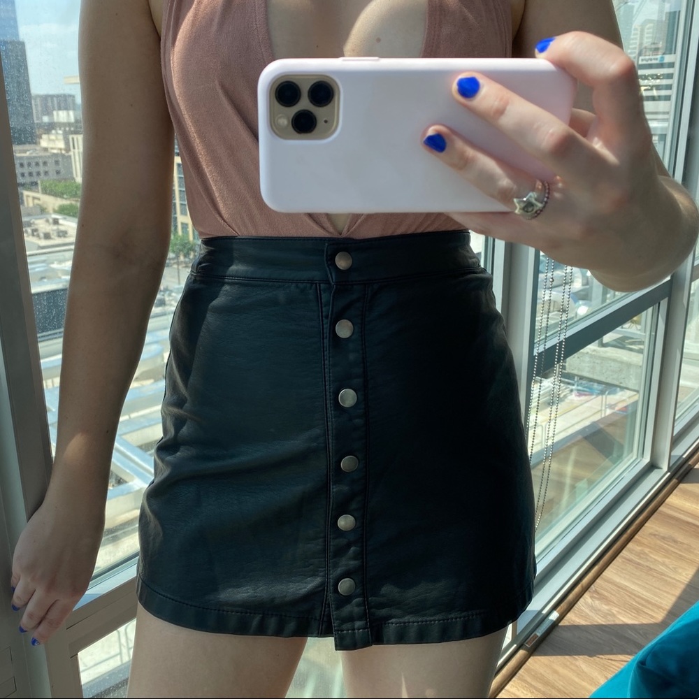 Black leather mini skirt